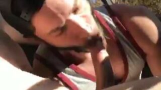 Outdoor gay blowjob by a slutty dick sucker in car